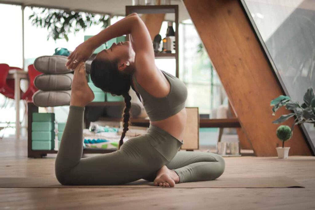 What is prana? Yoga is one of the principle ways to raise the prana in the system. Image of a woman in a yoga asana.